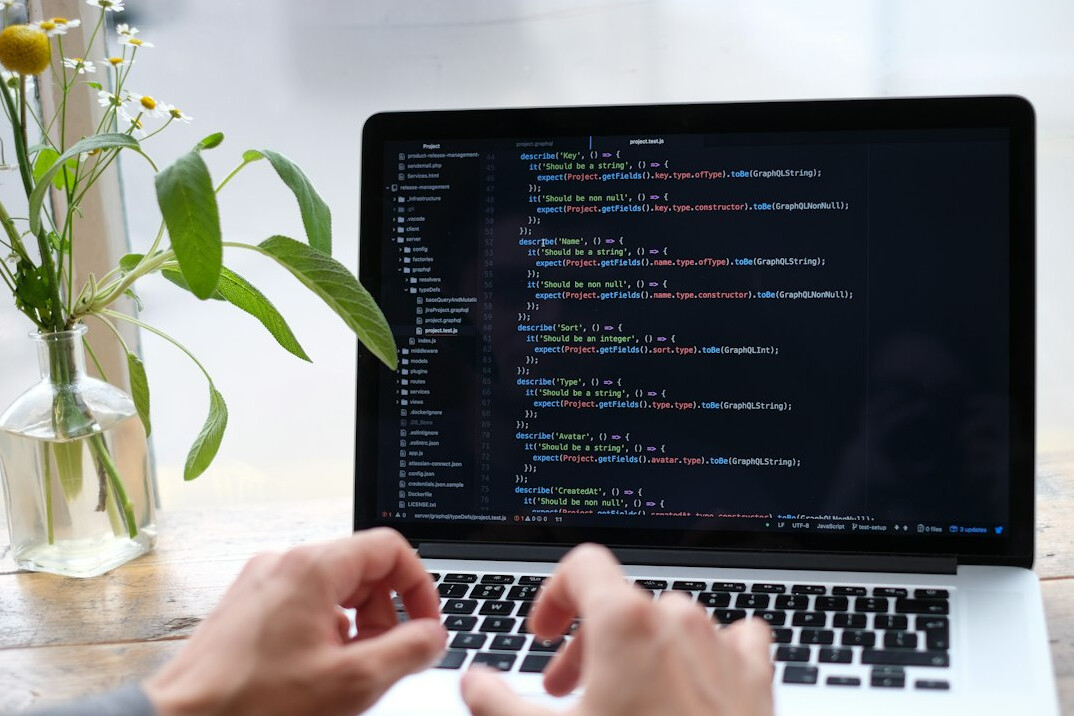person learning programming on computer
