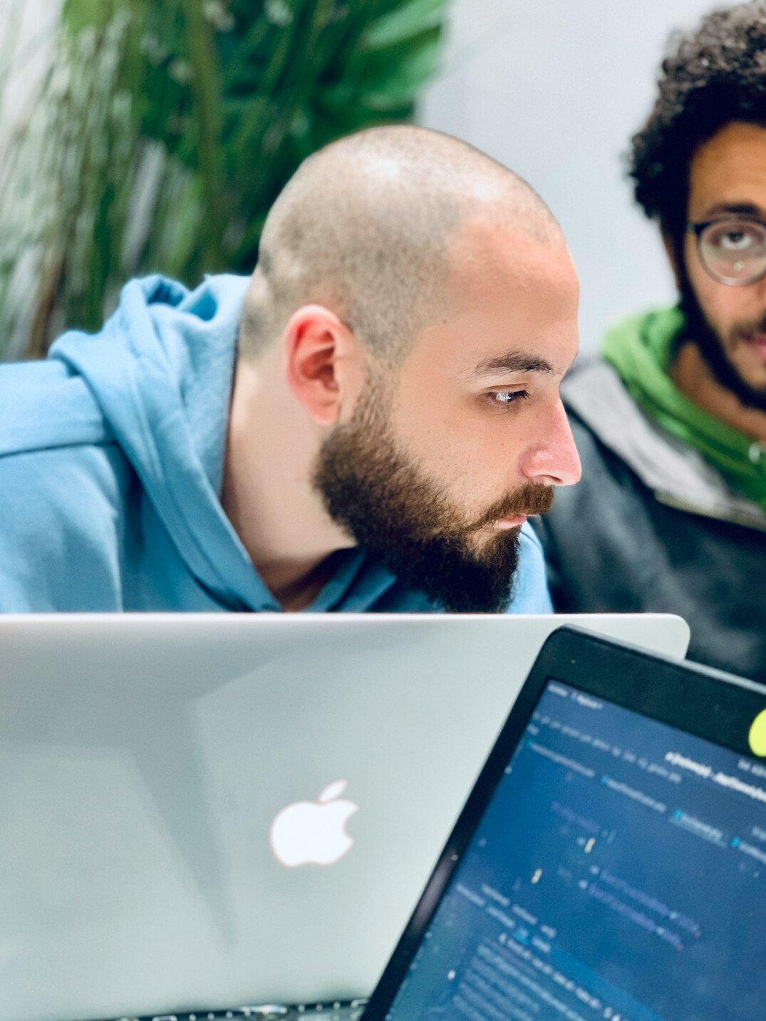 mentor guiding young developer