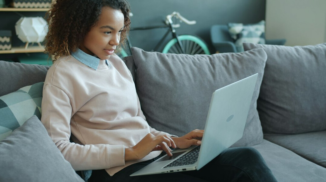 woman working on laptop at home