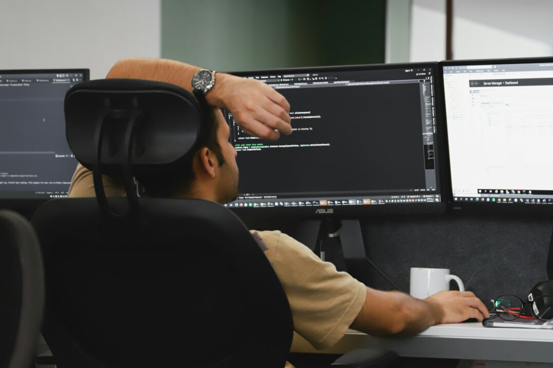 person learning programming on computer