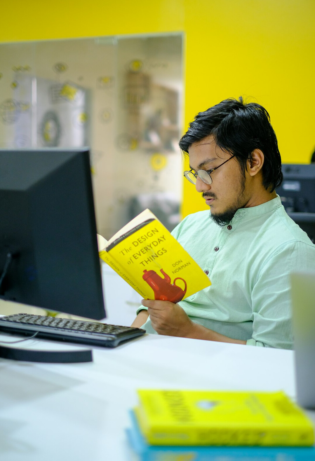 person studying programming books
